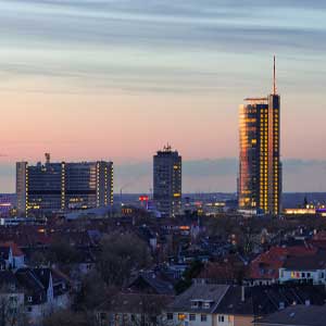 Hamburg skyline at sunset, skyscrapers and cityscape, modern urban face of the metropolis.