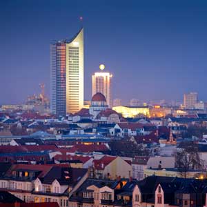 The Frankfurt am Main skyline at night, with its modern skyscrapers and historic buildings, is the perfect place for an exclusive escort service experience in the city.